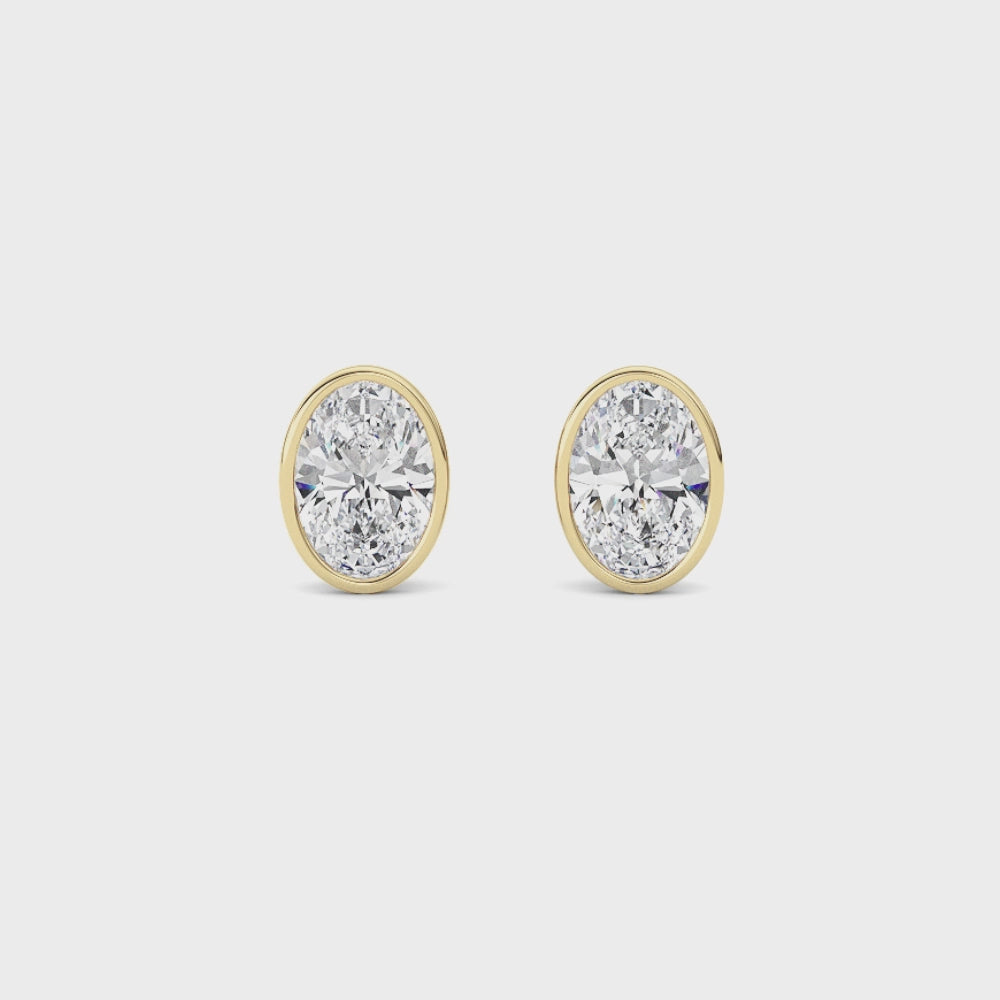 Oval Bezel Diamond Stud Earrings in 14K Yellow Gold