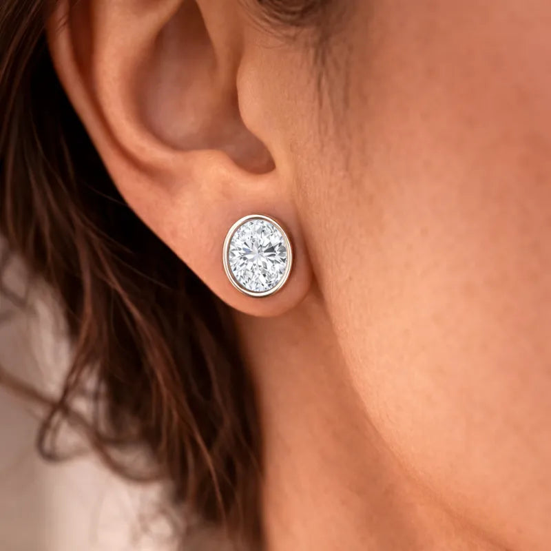 Oval Bezel Diamond Stud Earrings in 14K White Gold
